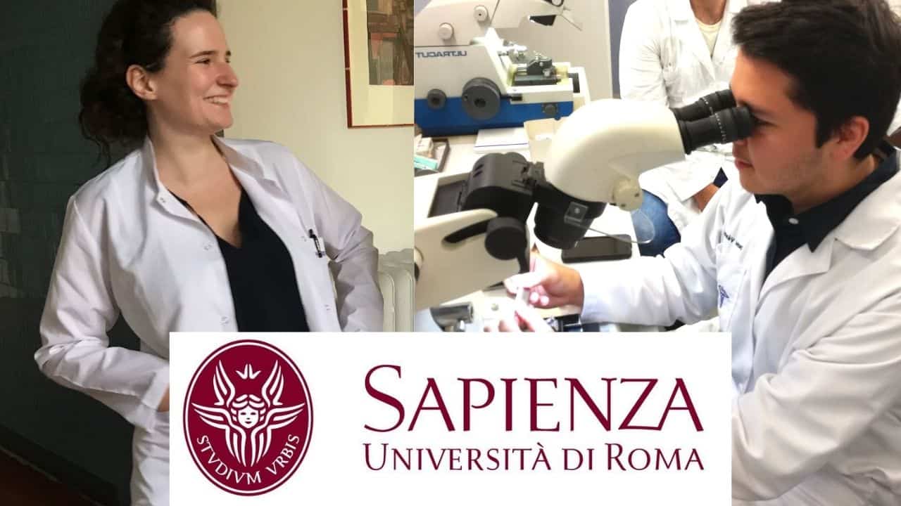 Two medical students from the english medicine and surgery programme in la sapienza university, one is looking into a microscope